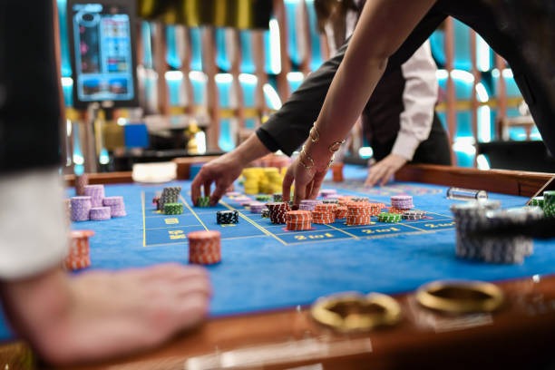 depo slot Playtech live dealer studio interface on mobile phone showing blackjack and baccarat tables